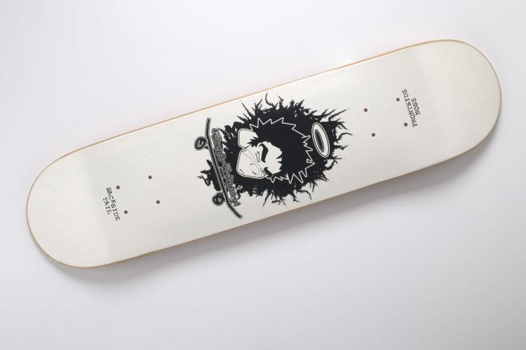 “4-Wheel” design of a man's head in center by Dustinn Craig on white skateboard.