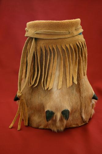 A pouch made from moose hide and deer dew claws