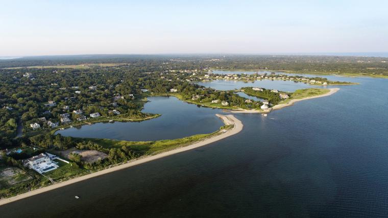 Aerial view of coastline and algae blooms in Shinnecock Bay