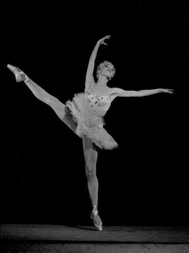 Ballerina Marjorie Tallchief photographed en pointe, or standing on her toes