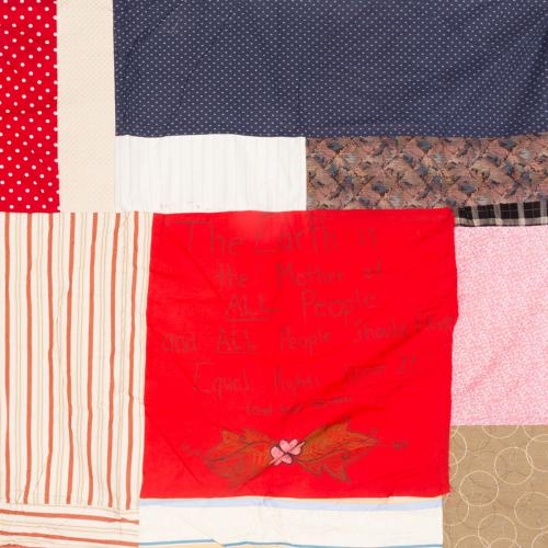 Closeup of quilt piece containing a quote from Chief Joseph