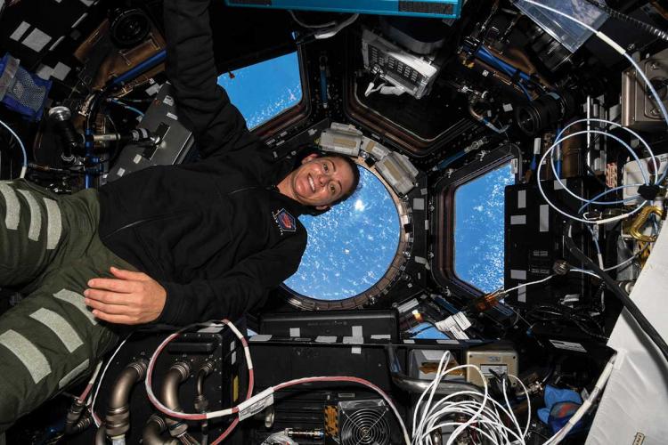An astronaut inside the International Space Station