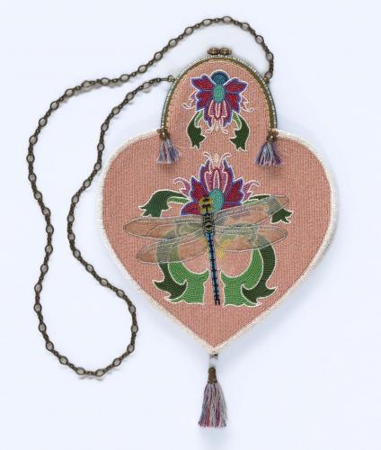 Pink beaded purse depicting flowers and dragonfly
