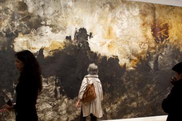 Woman staring at art in LaTocha Installation