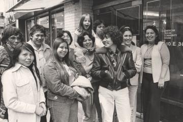 Staff and visitors standing outside the American Indian Community House